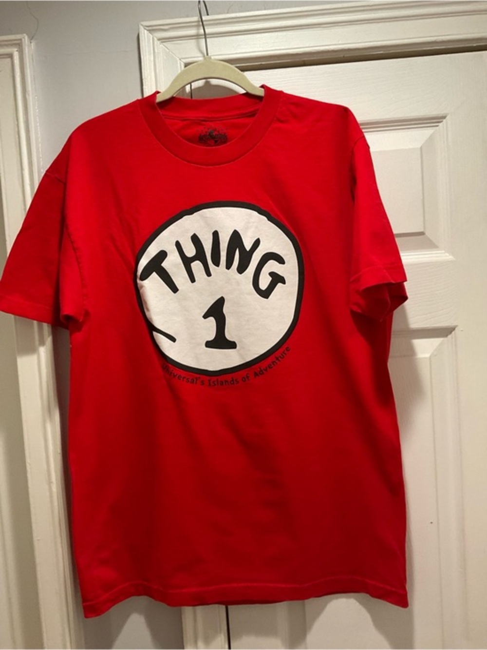 Universal Red Crewneck Graphic Tee with Black Logo